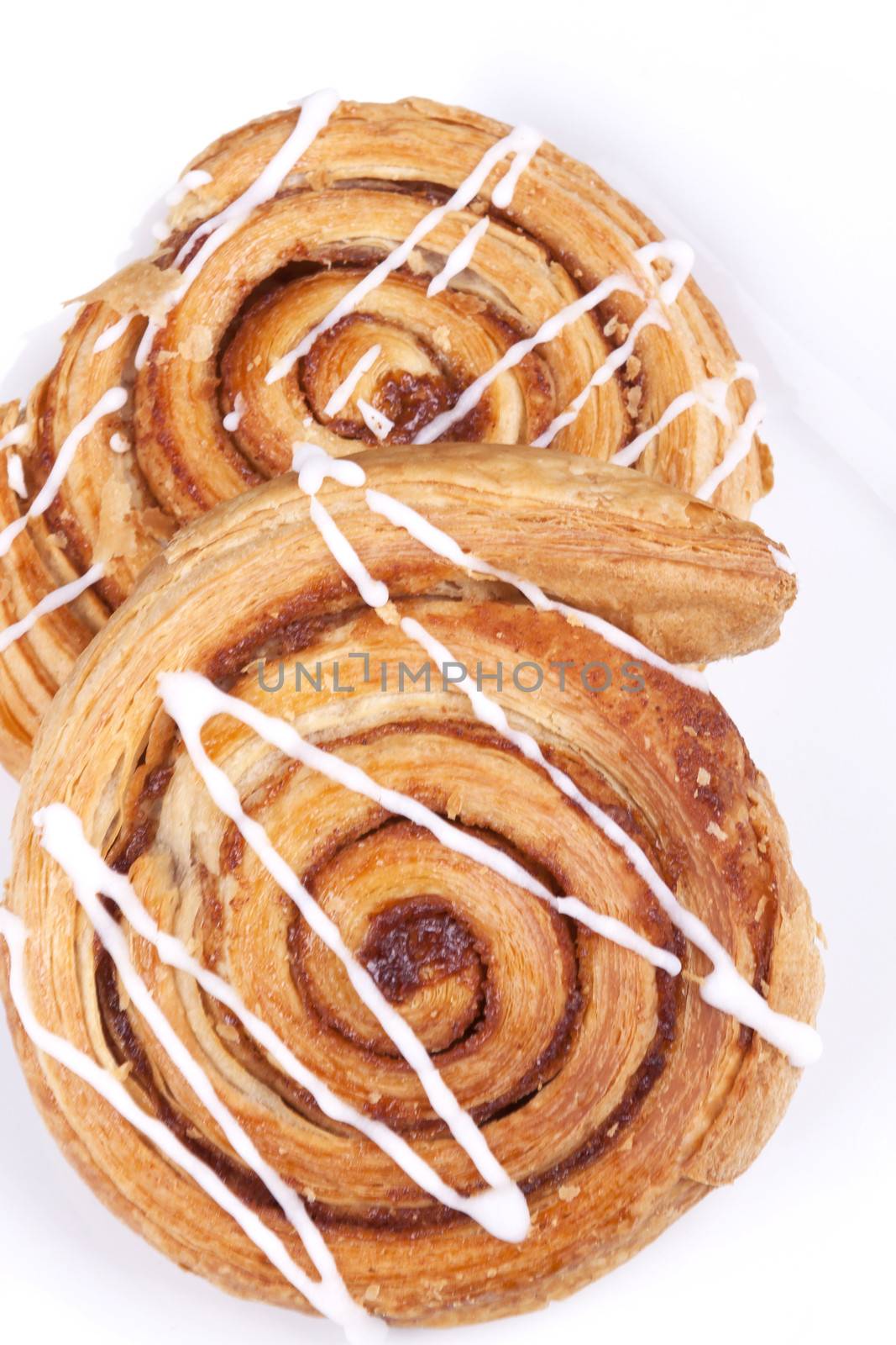 cinnamon danish isolated on white background.