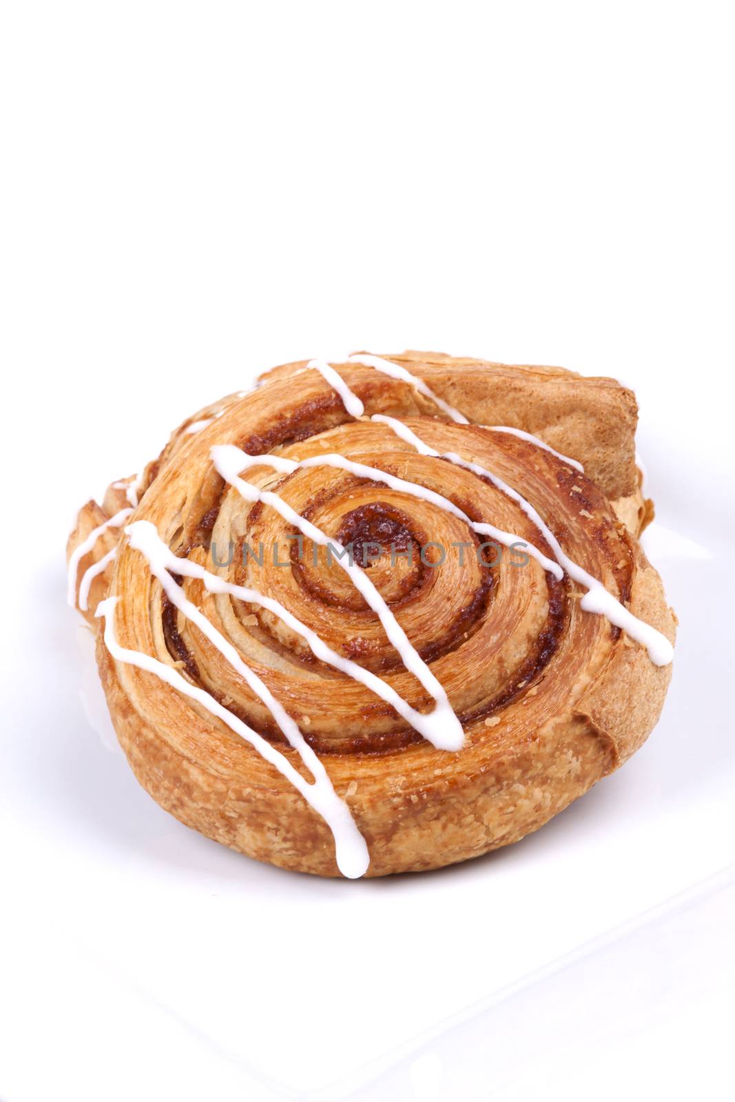 cinnamon danish isolated on white background.