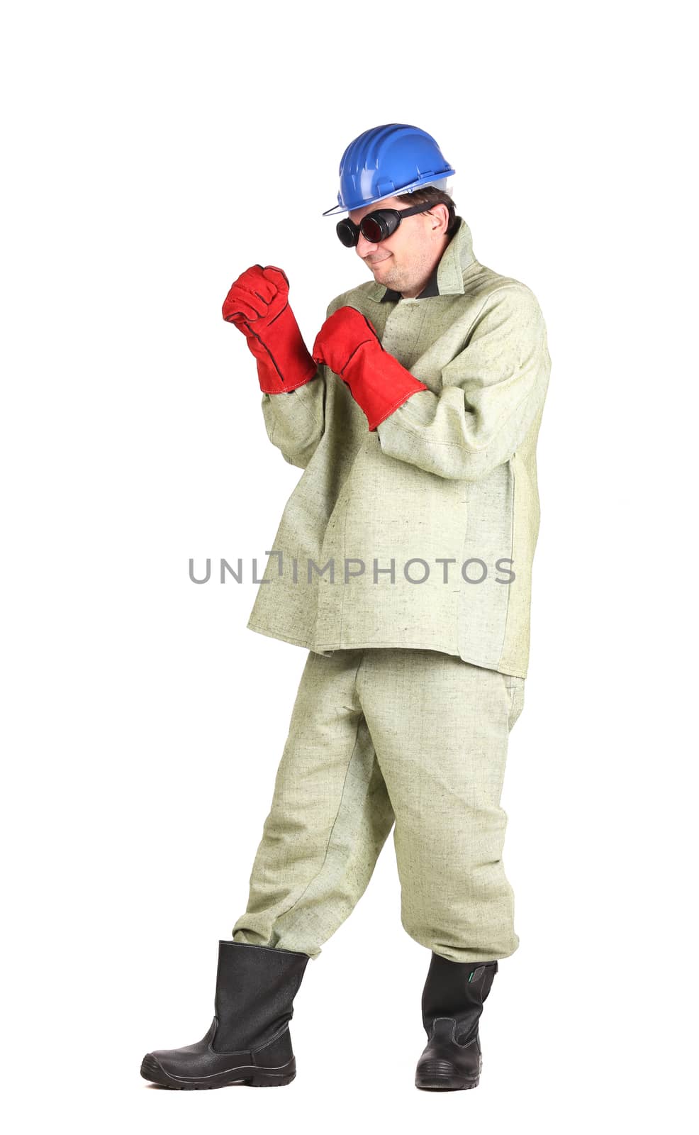 Welder in hard hat boxing. Isolated on a white background.