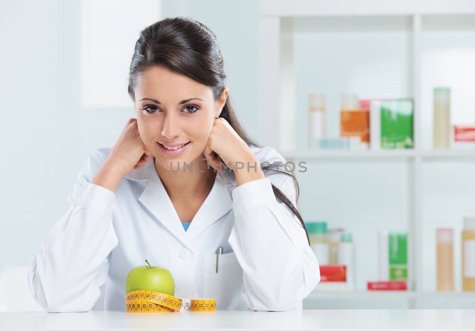 Portrait of a nutritionist female Doctor in her office