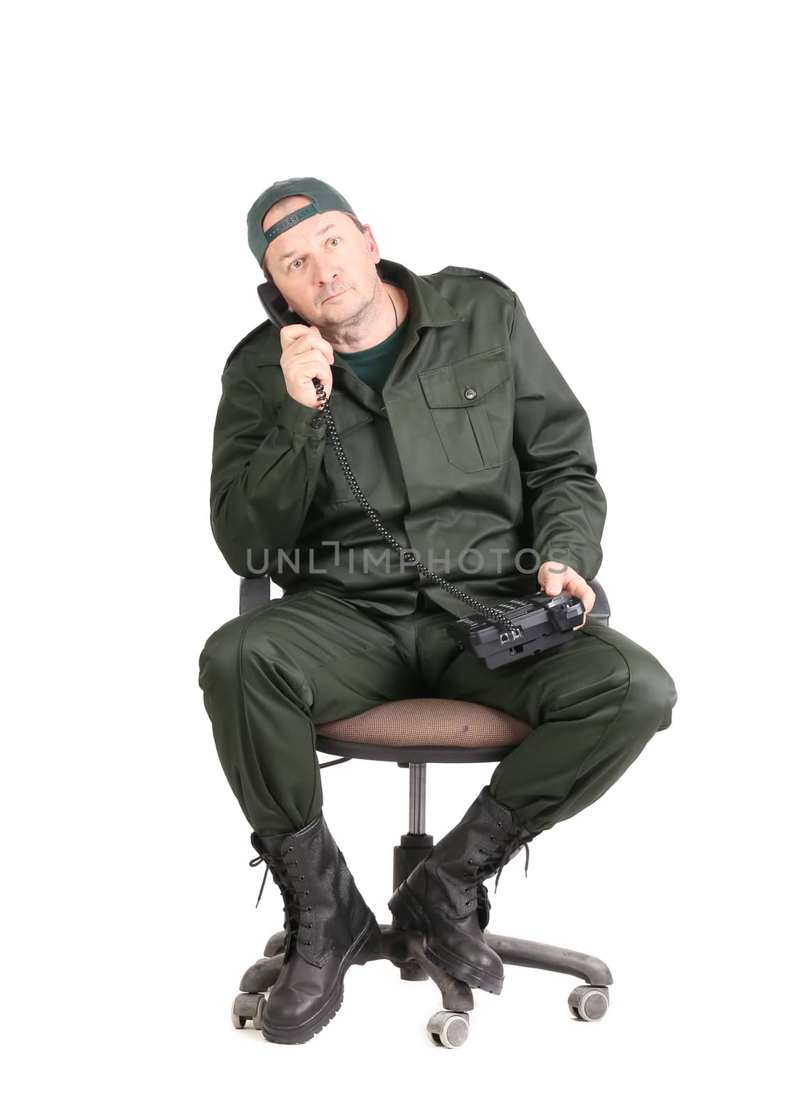 Worker talking on the phone. Isolated on a white background.