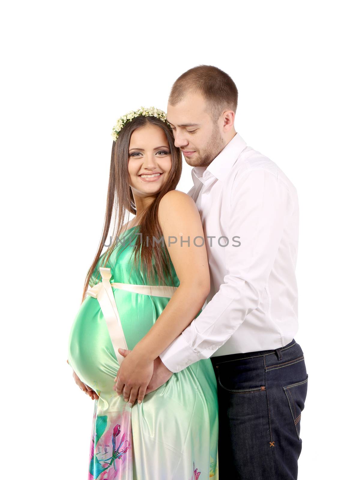 Happy couple expecting baby. by indigolotos