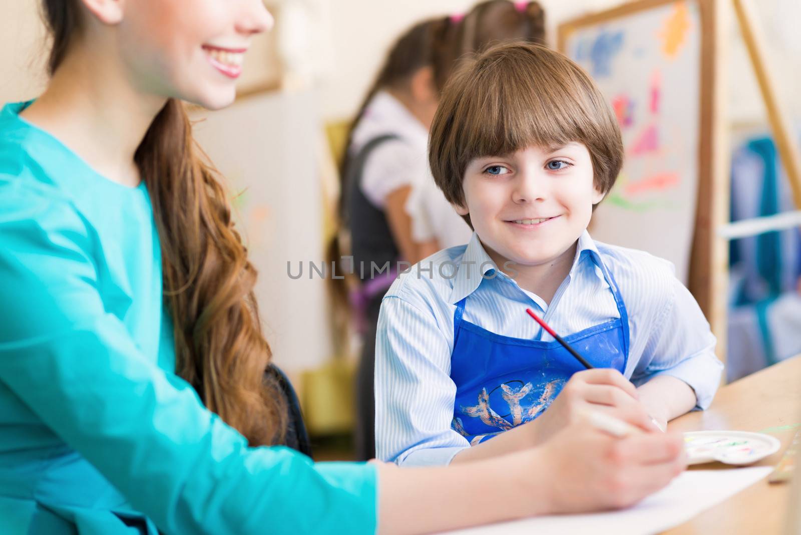 teacher and student in the classroom by adam121