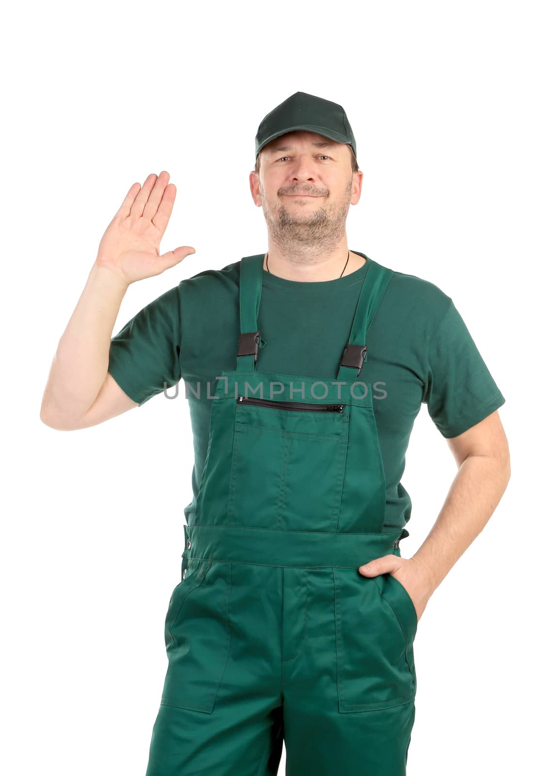 Confident worker in overalls. Isolated on a white background.