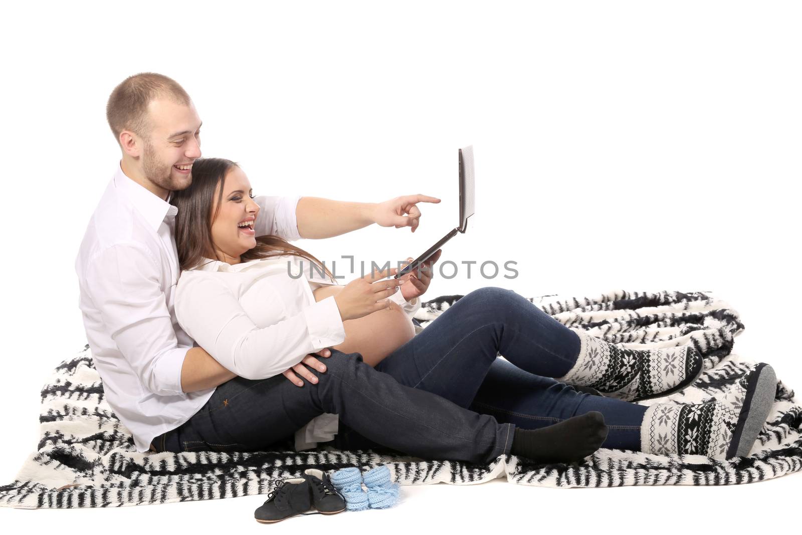 Beautiful man and pregnant woman. Isolated on a white background.