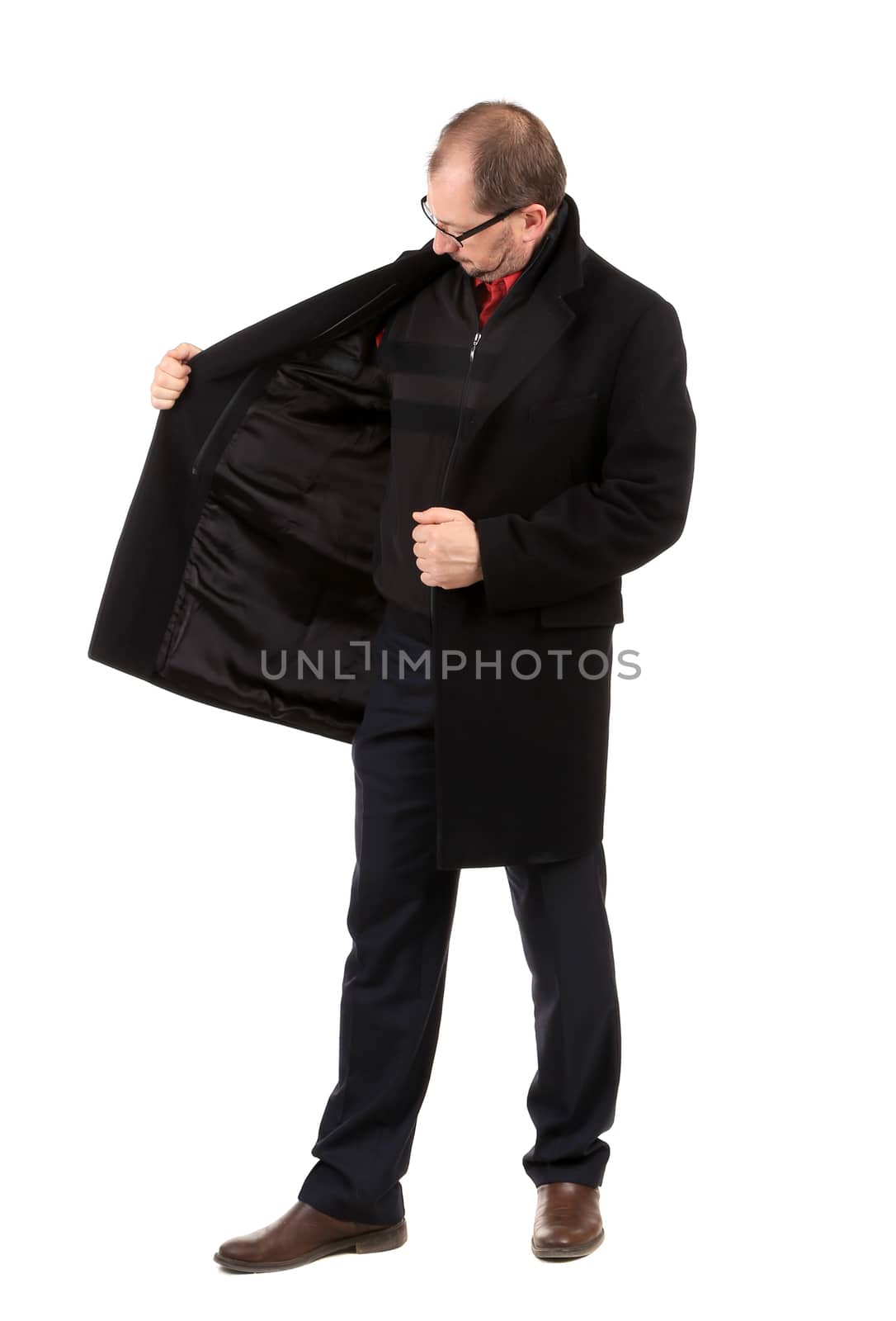 Handsome tall businessman. Isolated on a white background.