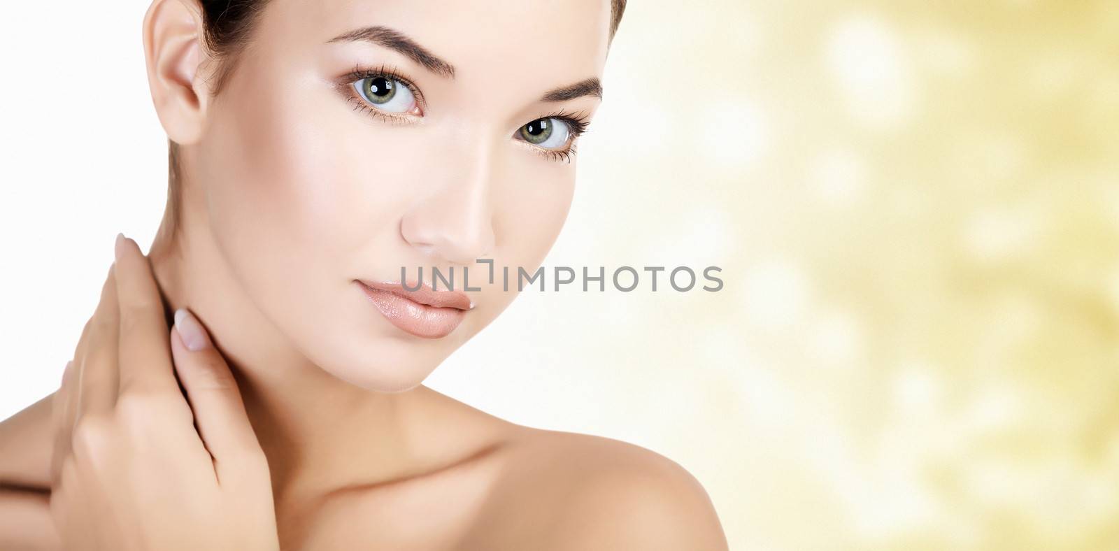 Pretty asian woman against an abstract background with circles and copyspace
