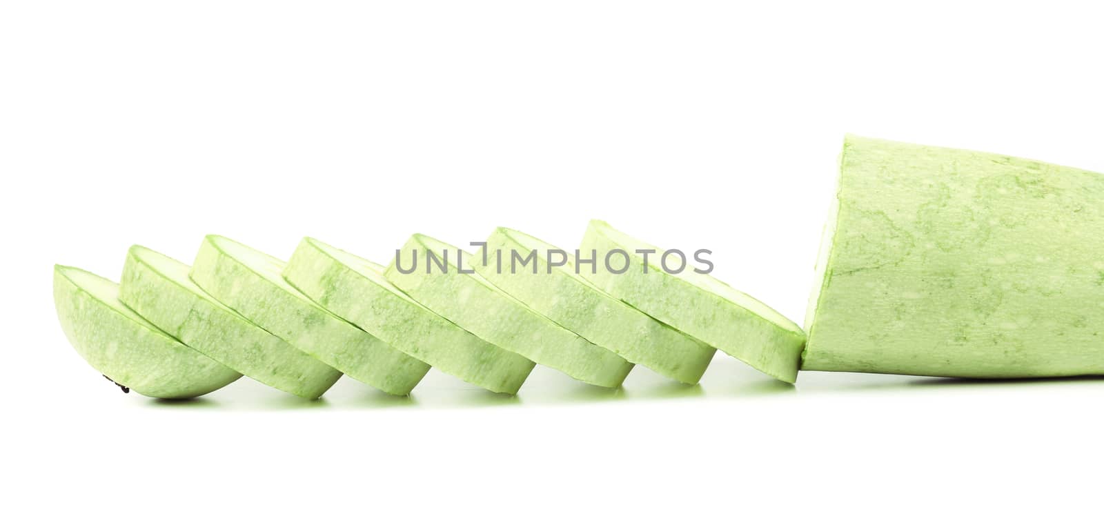 Fresh vegetable marrow and slices. Isolated on a white background.