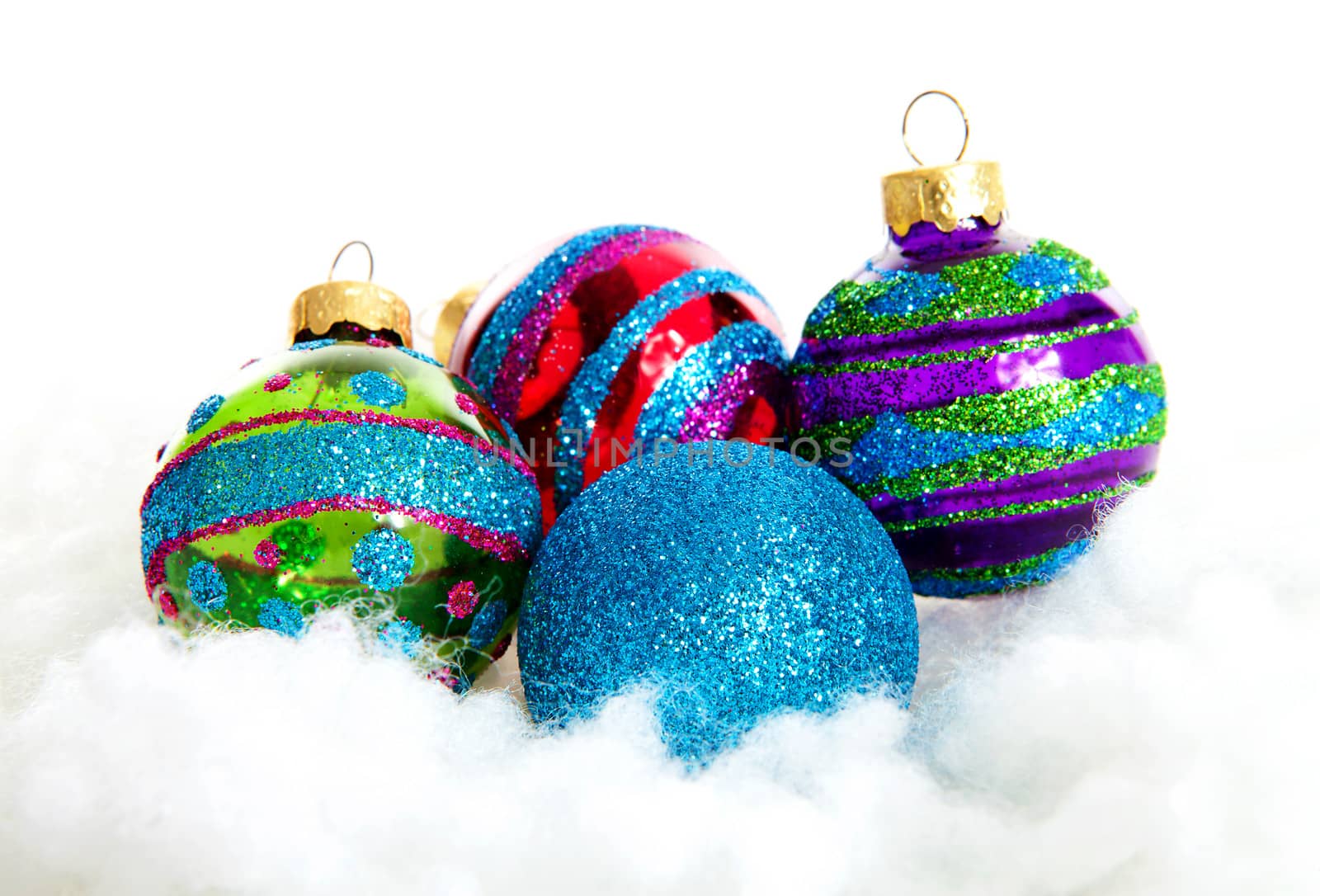 Colorful glitter Christmas balls over white background