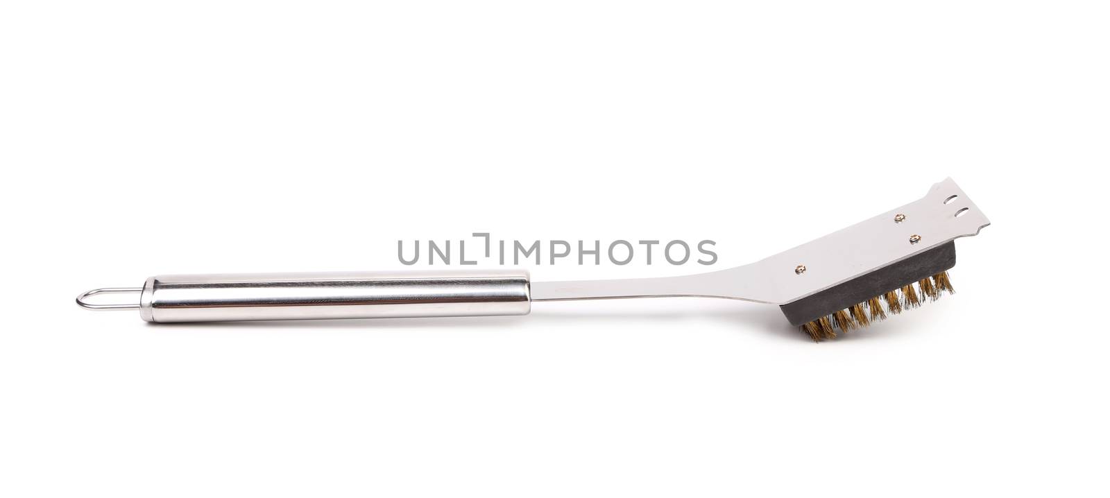 Close up of BBQ grill brush. Isolated on a white background.