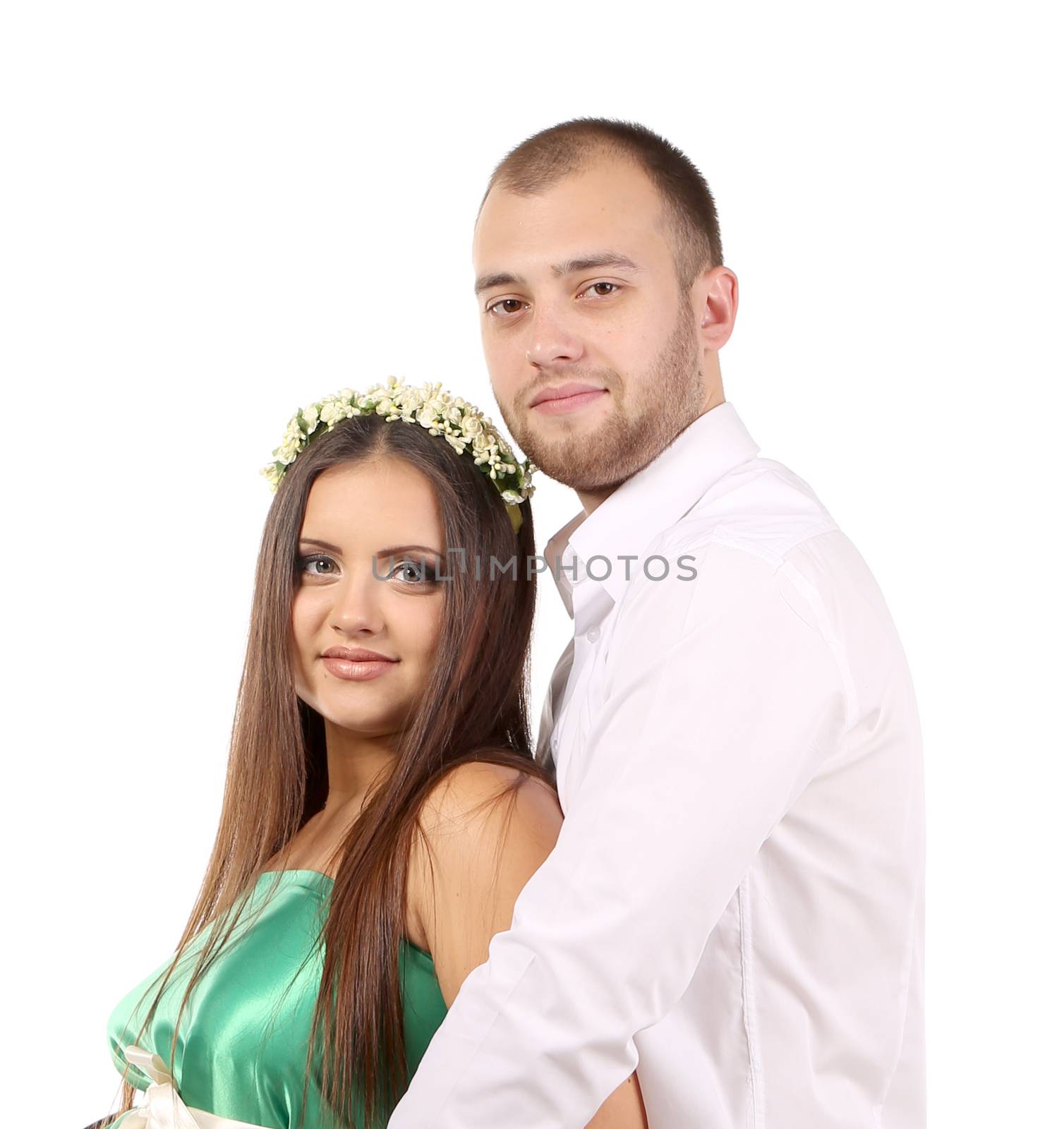 Happy young couple. Isolated on a white background.