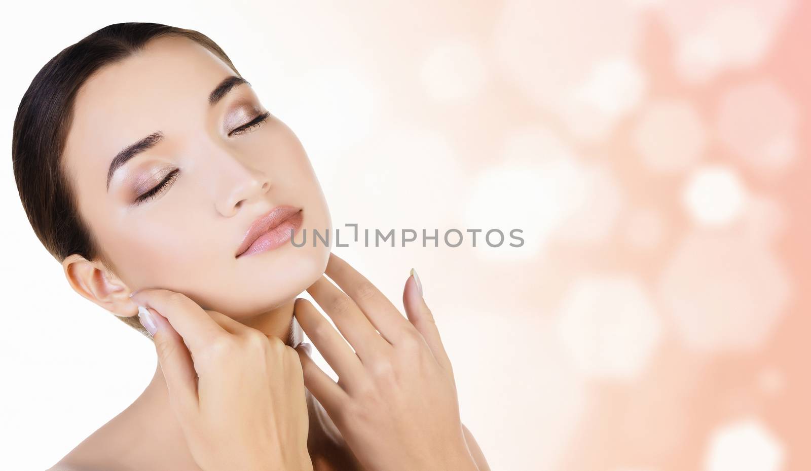 Asian girl with fresh skin on pastel blurred background, copyspace