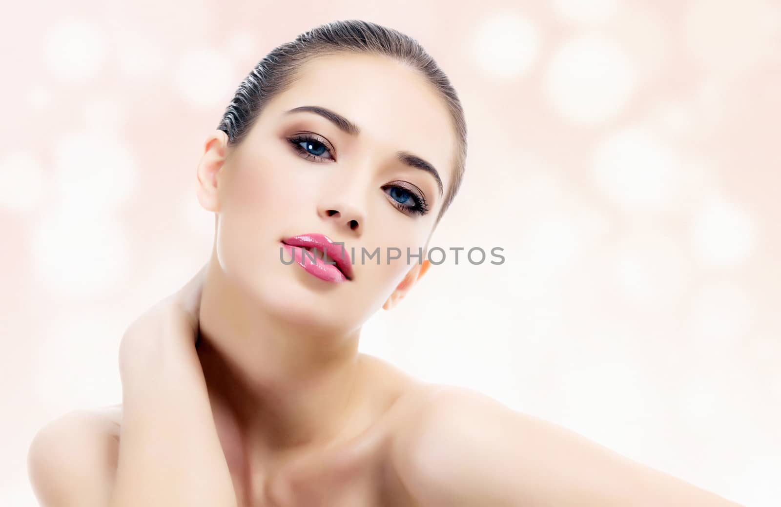 Pretty woman against an abstract background with circles and copyspace