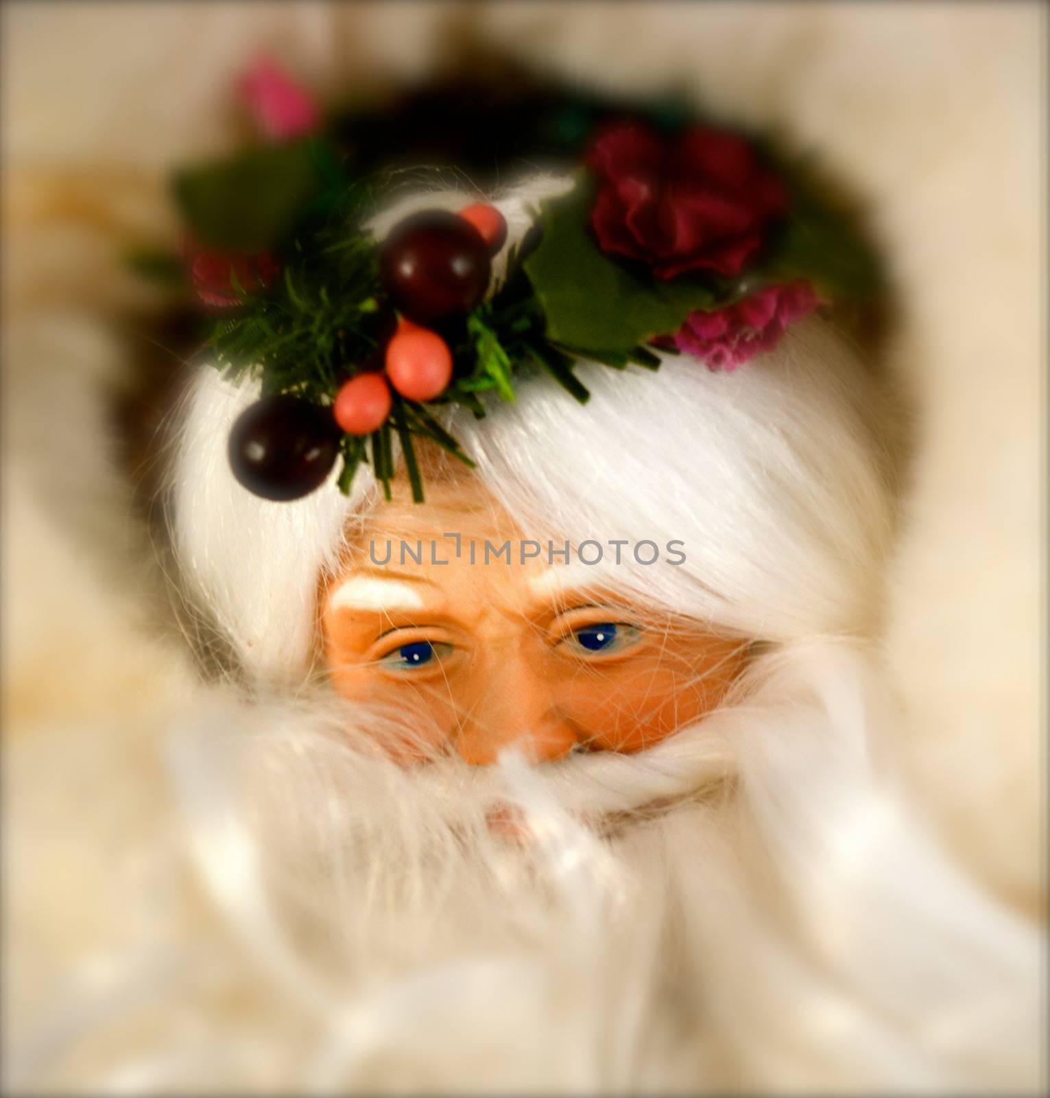 Santa Claus stares out from behind beard