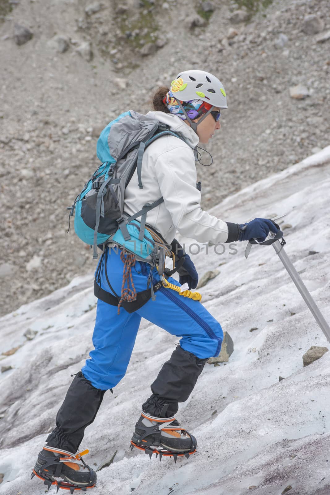 Girl clumb up on the ice by kozak