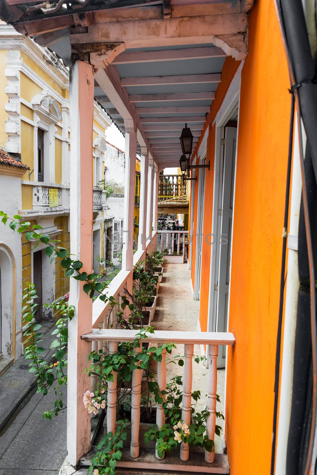 View of orange and white colonial balcony in the historic city of Cartagena, Colombia