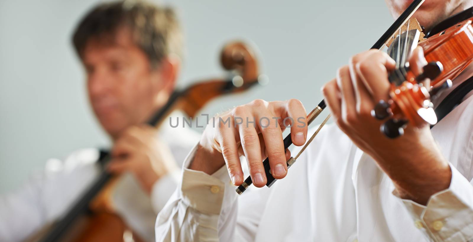 Classical music: Violinist playing at the concert