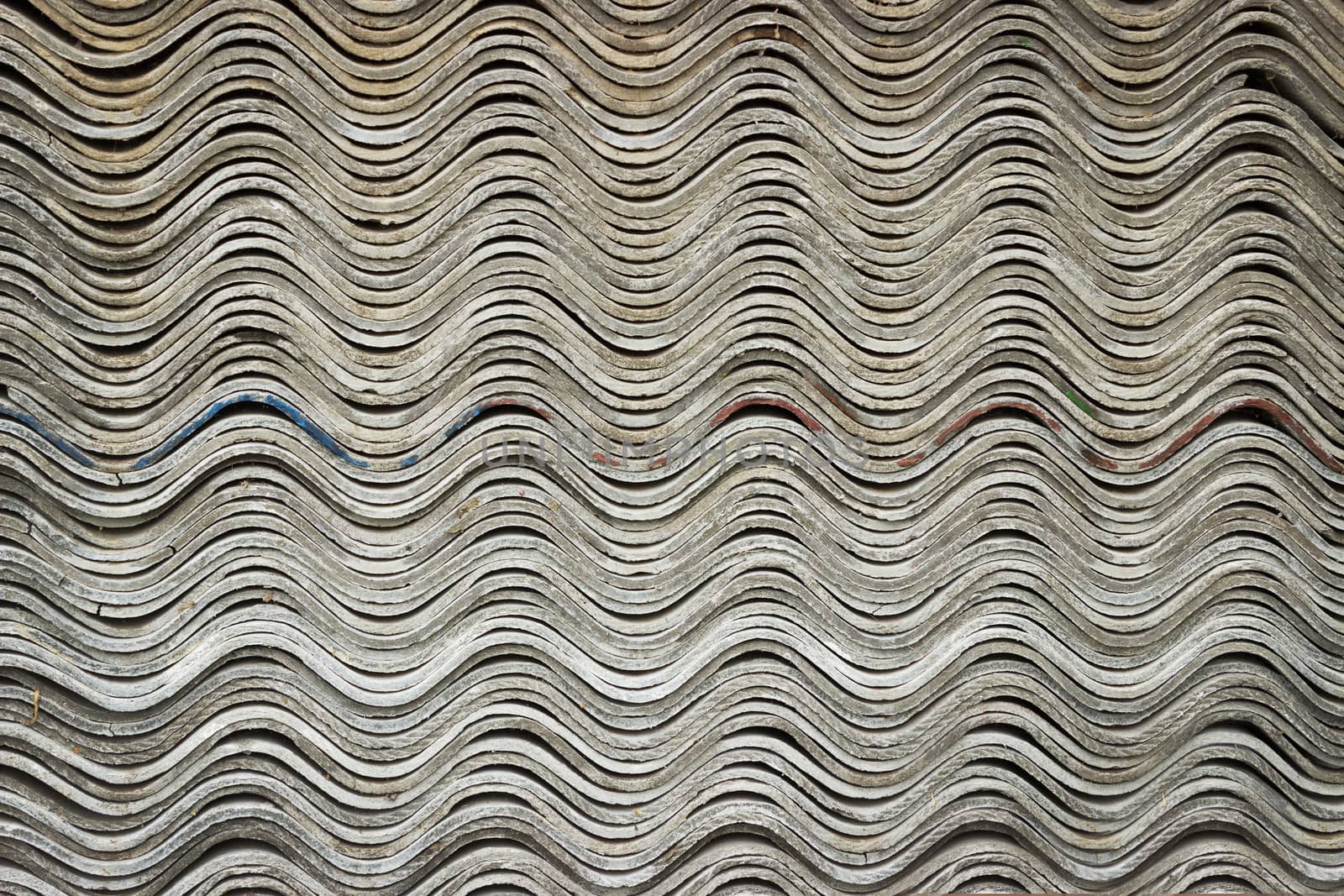 Corrugated slate, folded into each other as background