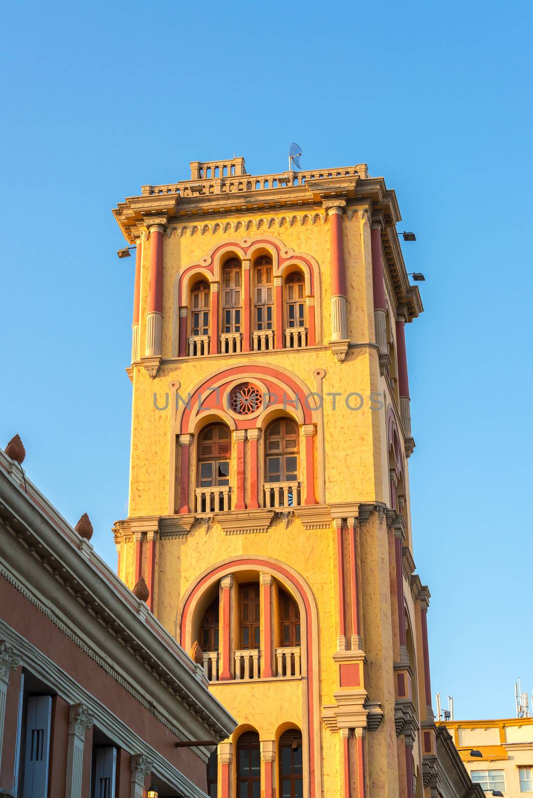 Tower of Cartagena Public University bathed in golden late afternoon light in Cartagena, Colombia