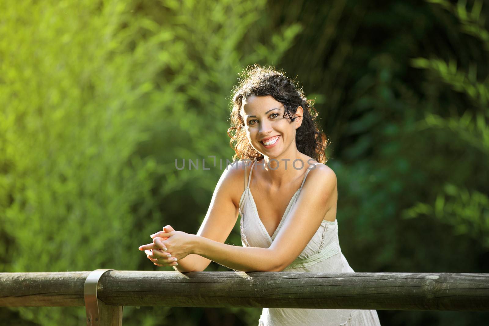 Portrait of a beautiful young woman smiling at camera