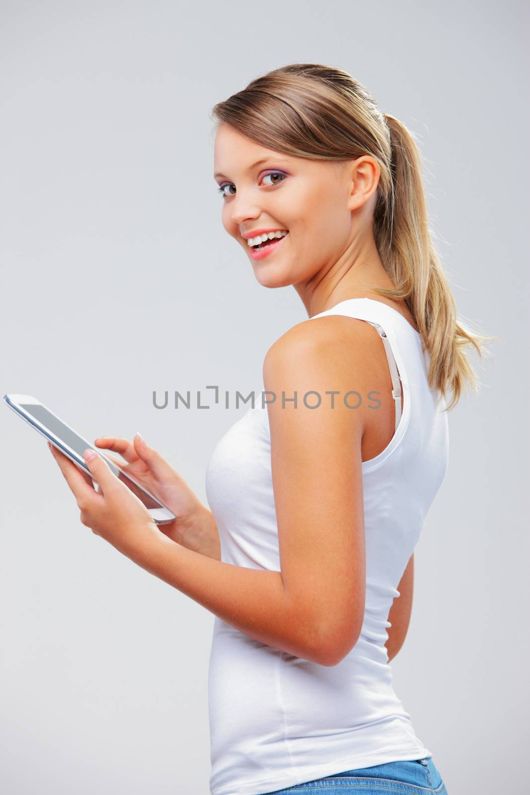 Portrait of beautiful girl with her digital tablet