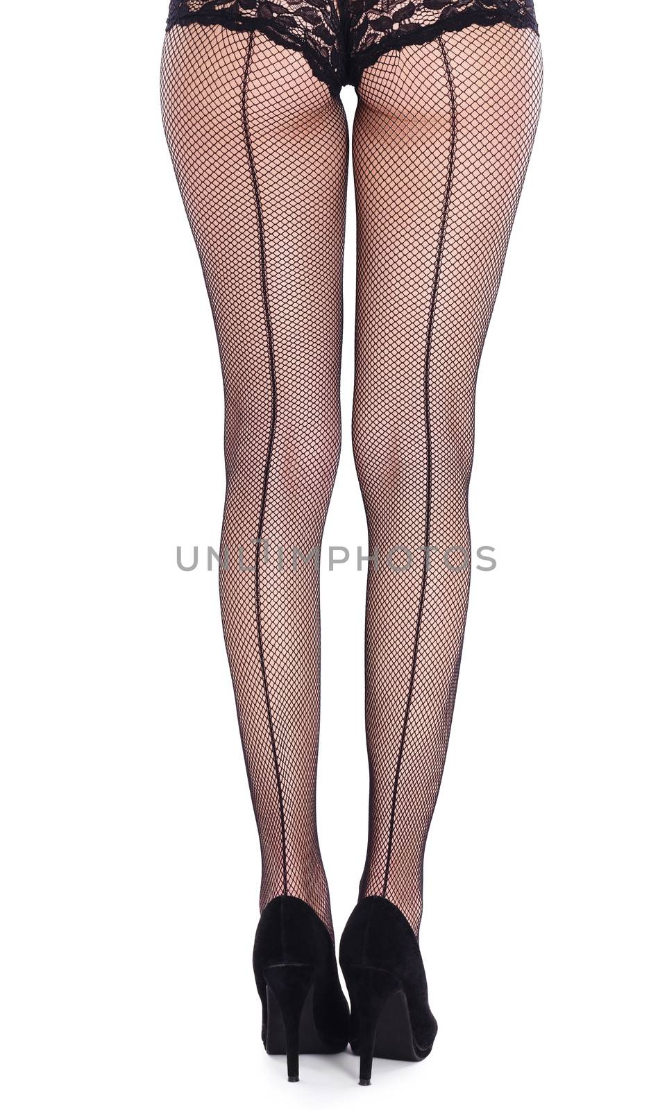 beautiful legs from behind in fish-net stockings on white background