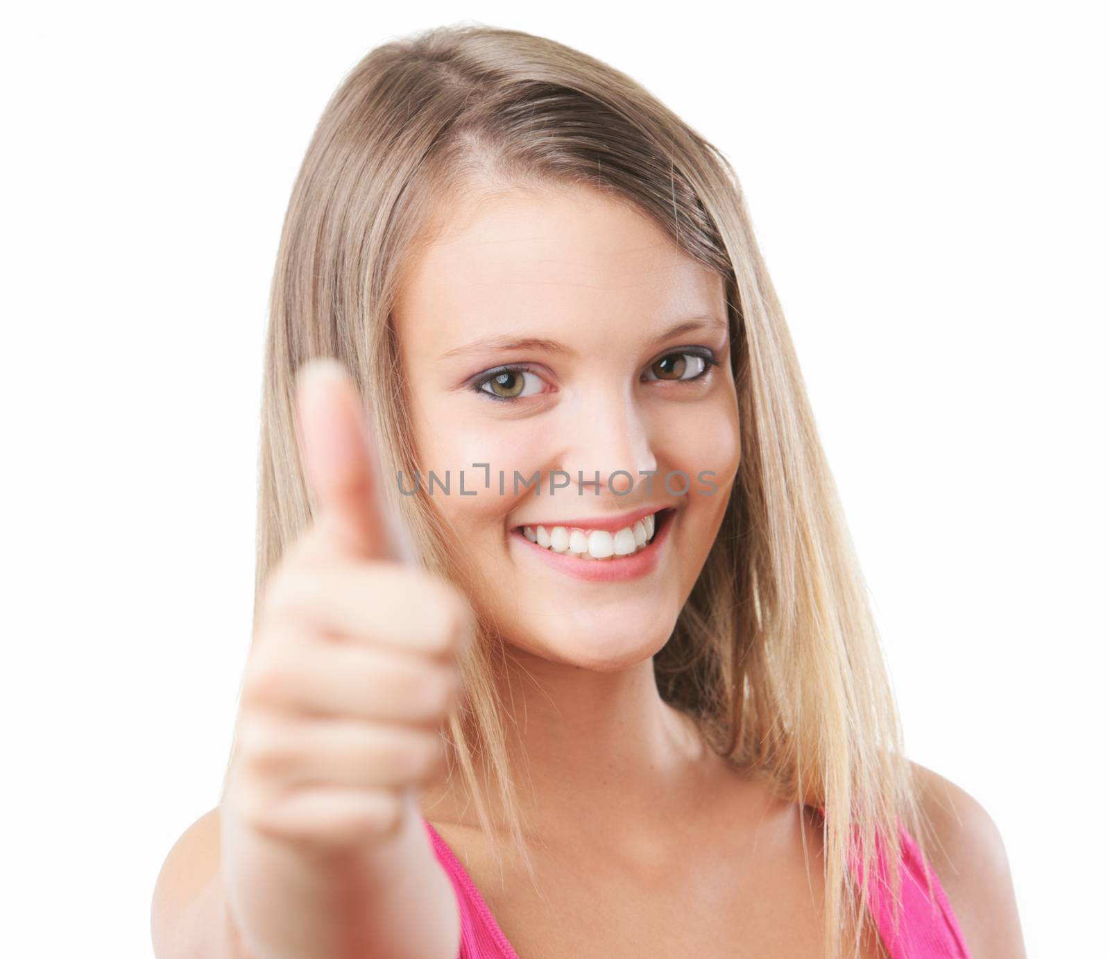 Happy, blonde girl, smiling while giving the thumbs up gesture