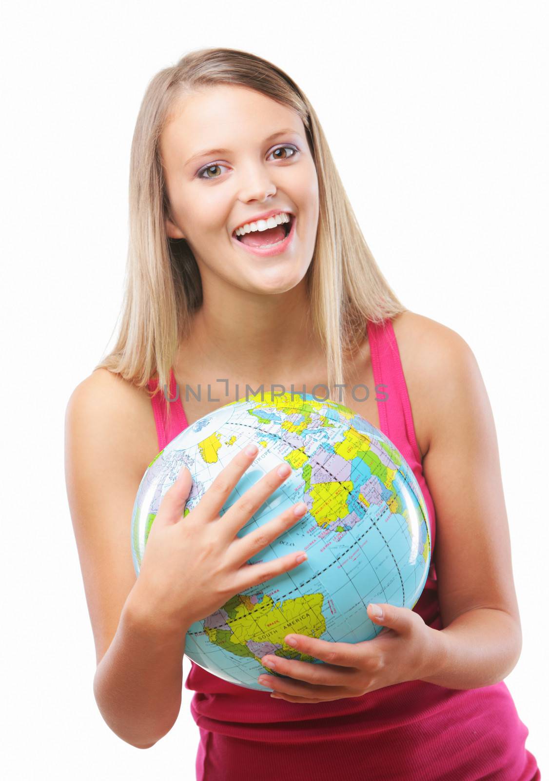 Portrait of a happy blonde girl  holding a globe against white background 