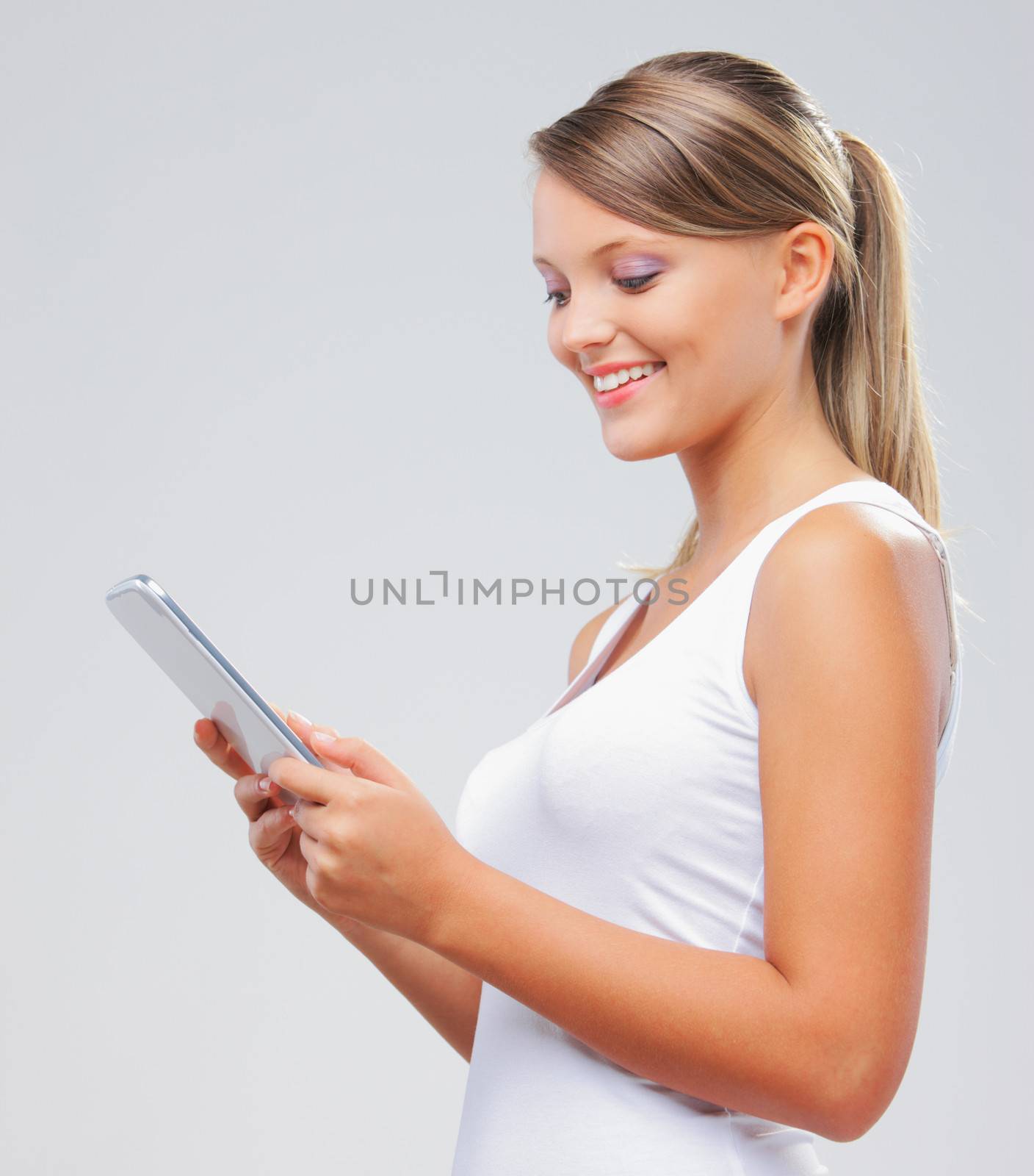 Portrait of beautiful girl with her digital tablet