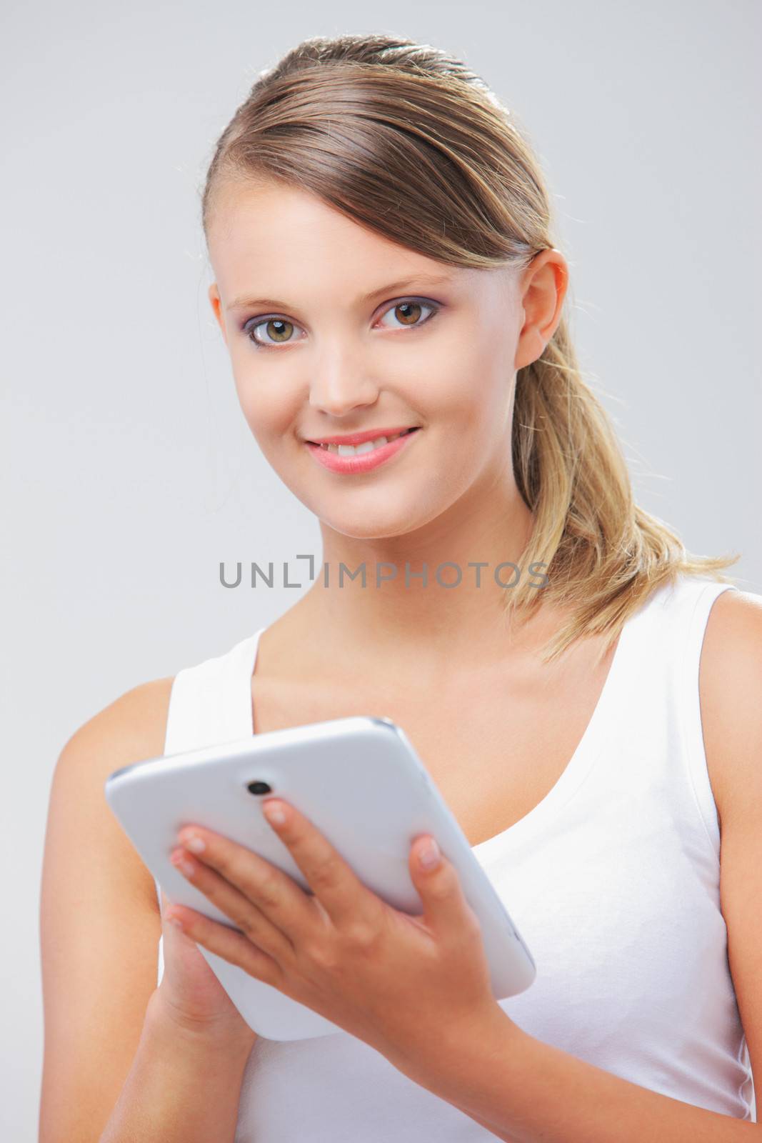 Portrait of beautiful girl with her digital tablet