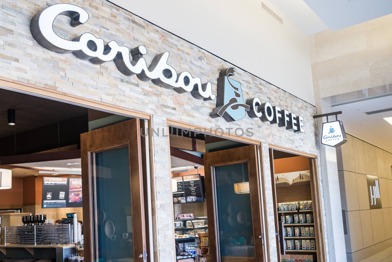 Caribou Coffee store and logo in Mall of America by IVYPHOTOS