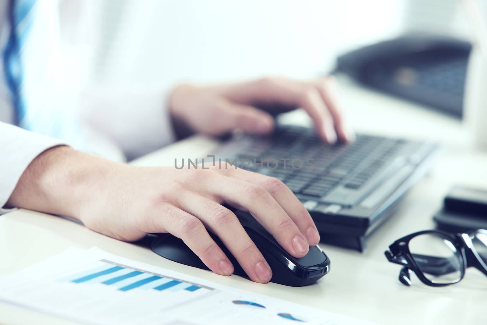 Close up shot of young businessman working in office