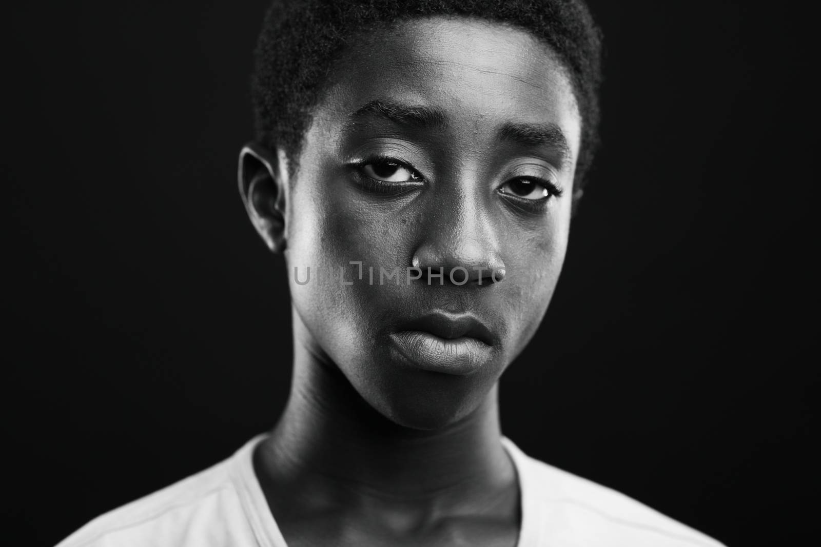 Portrait of an African boy on balck background