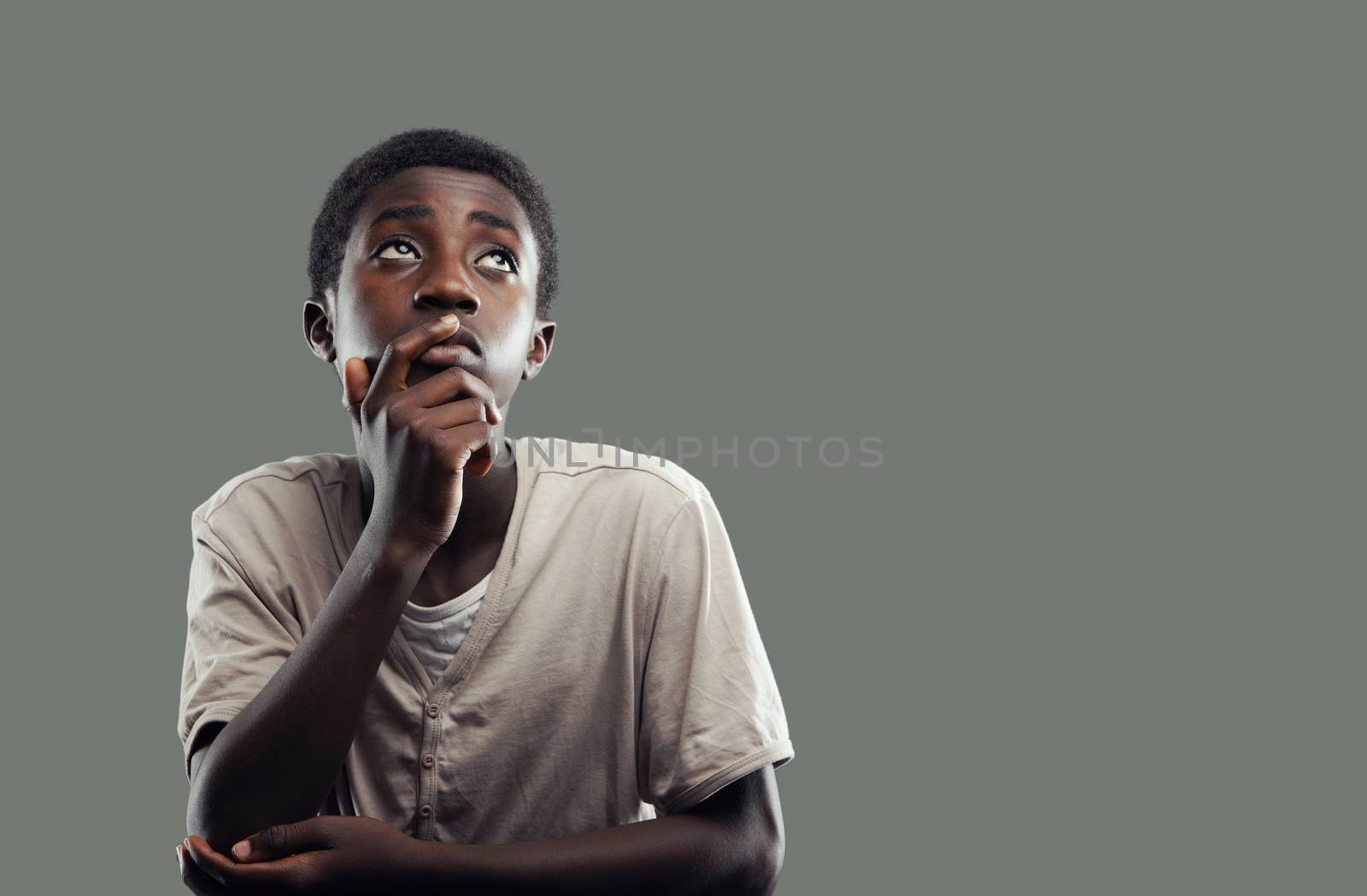 Portrait of an African boy looking up