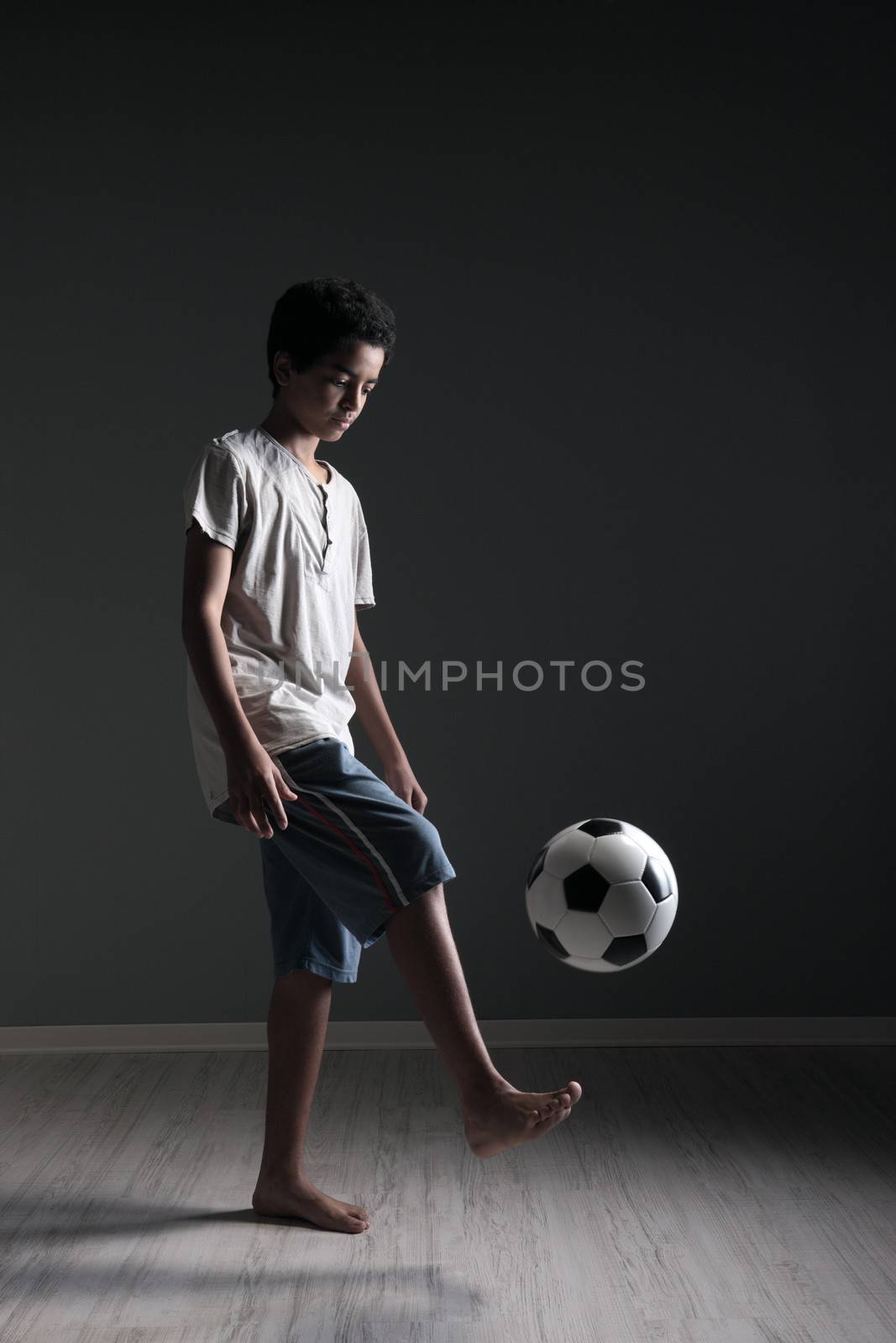 Teenage Soccer Player by stokkete