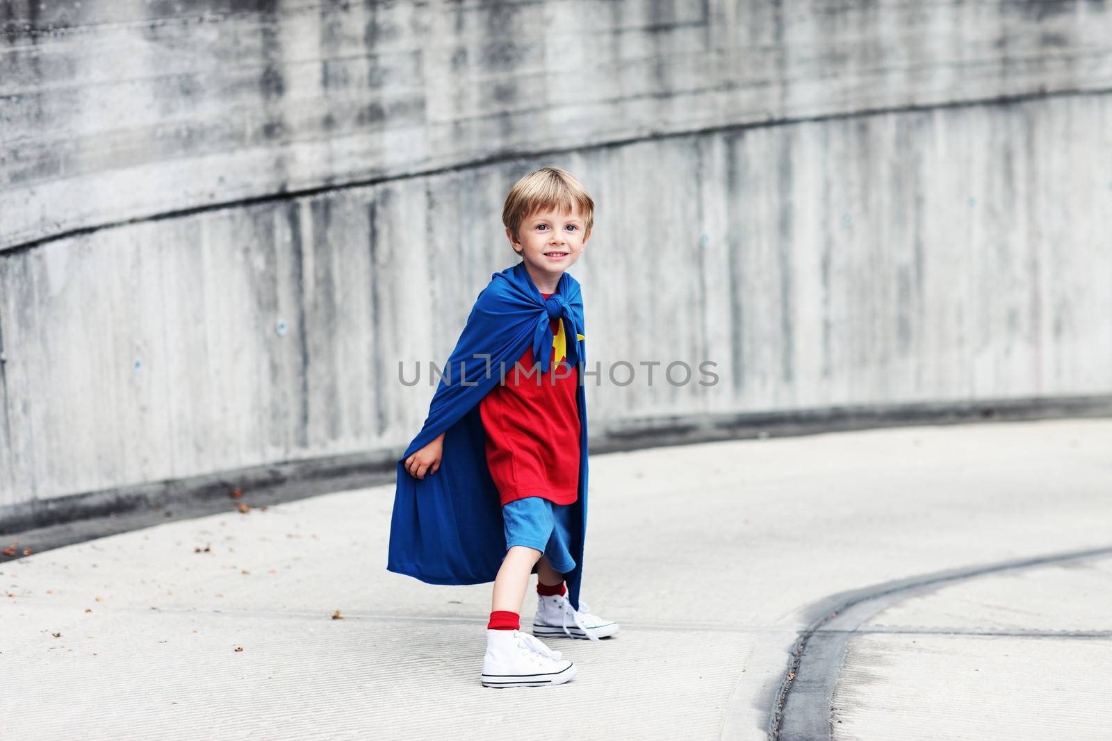 A young boy dreams of becoming a superhero.