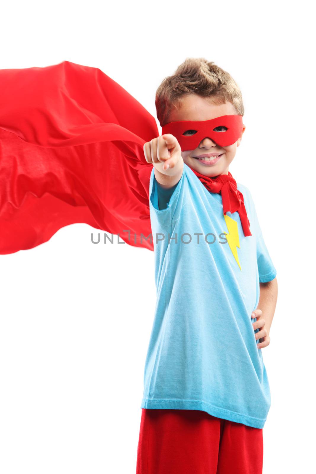 A young boy superhero pointing at you