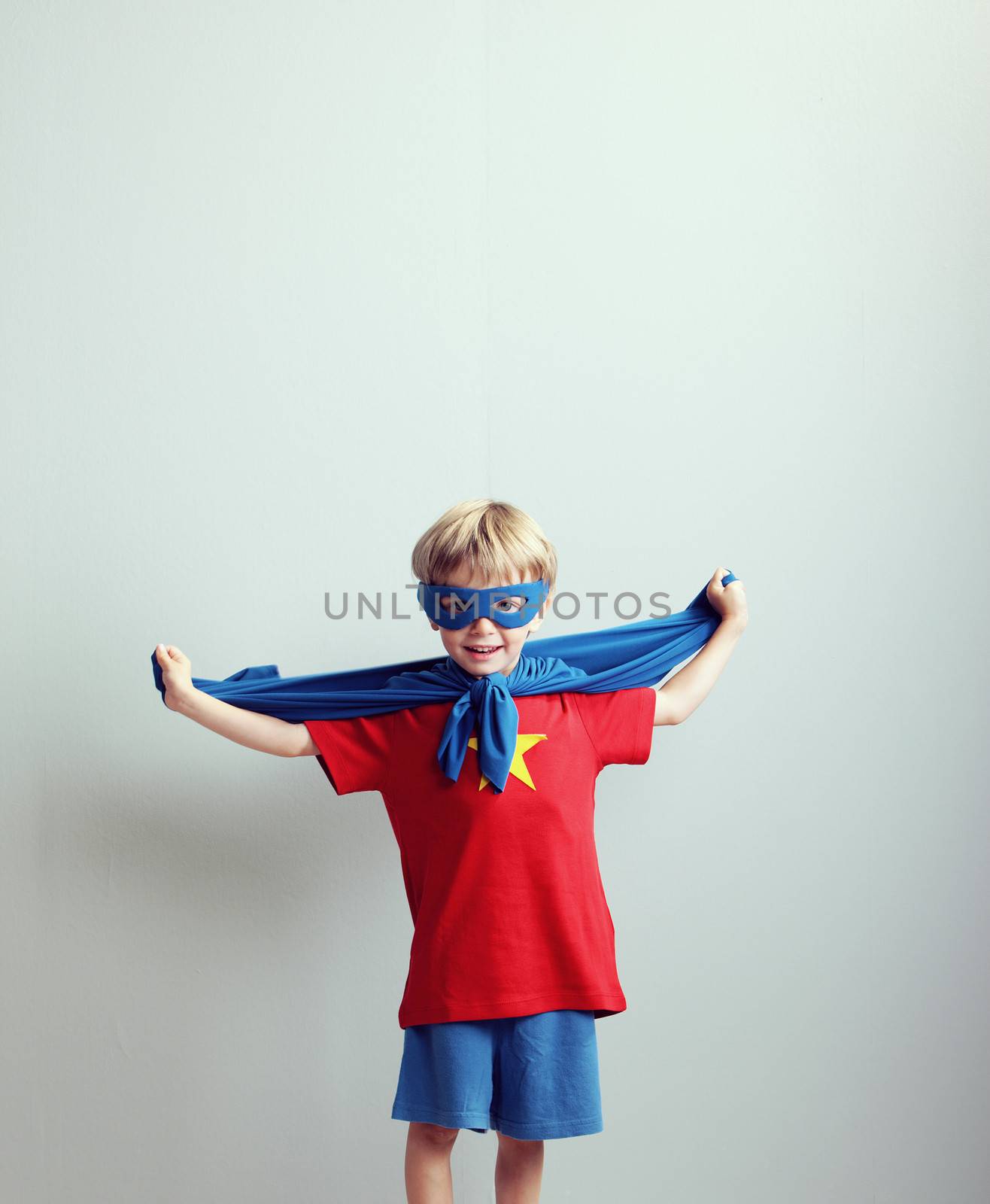 A young boy dreams of becoming a superhero.