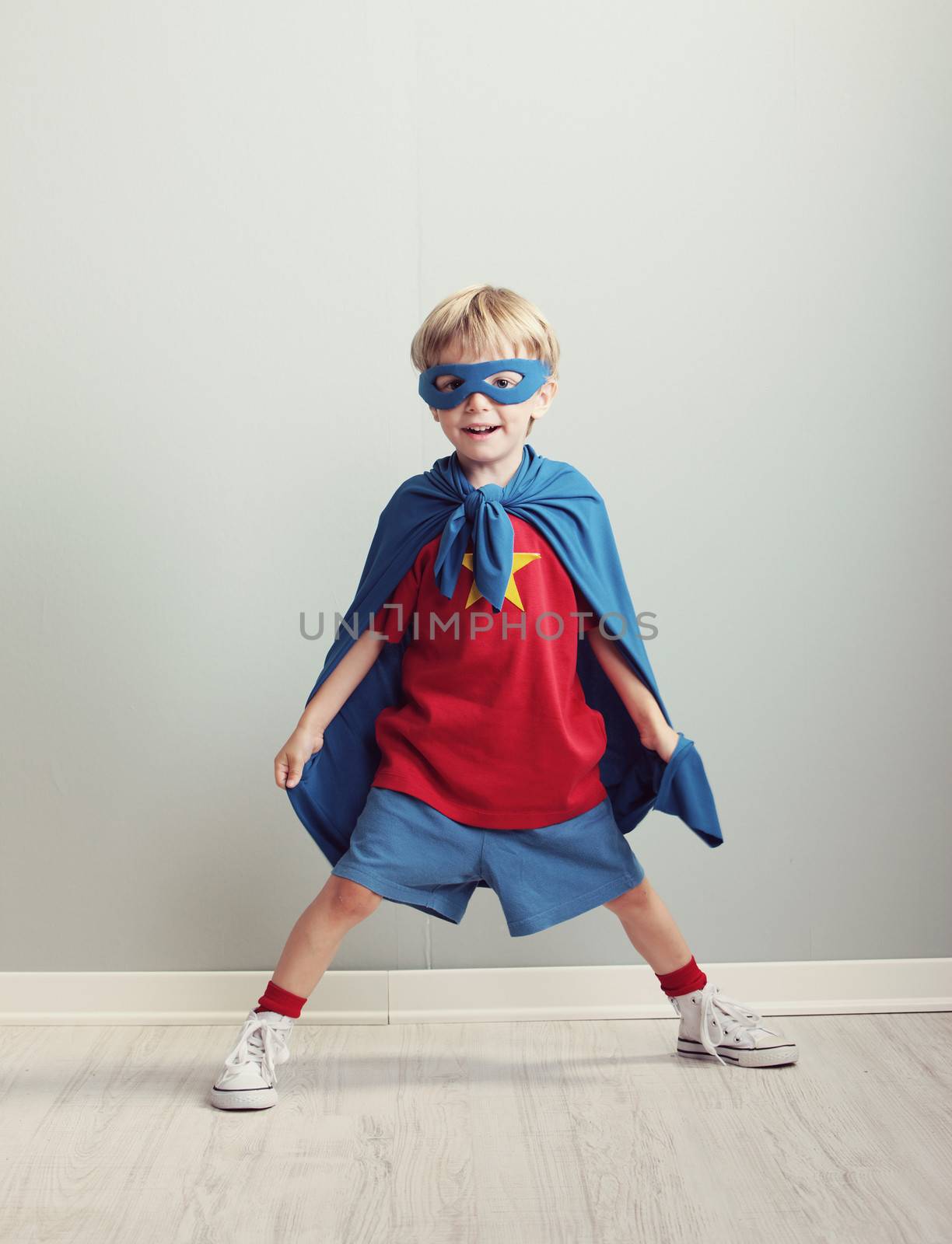 A young boy dreams of becoming a superhero.