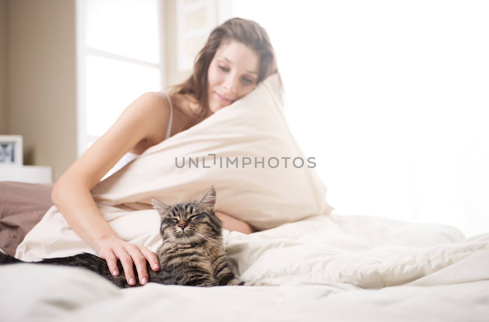 Woman with cat by stokkete