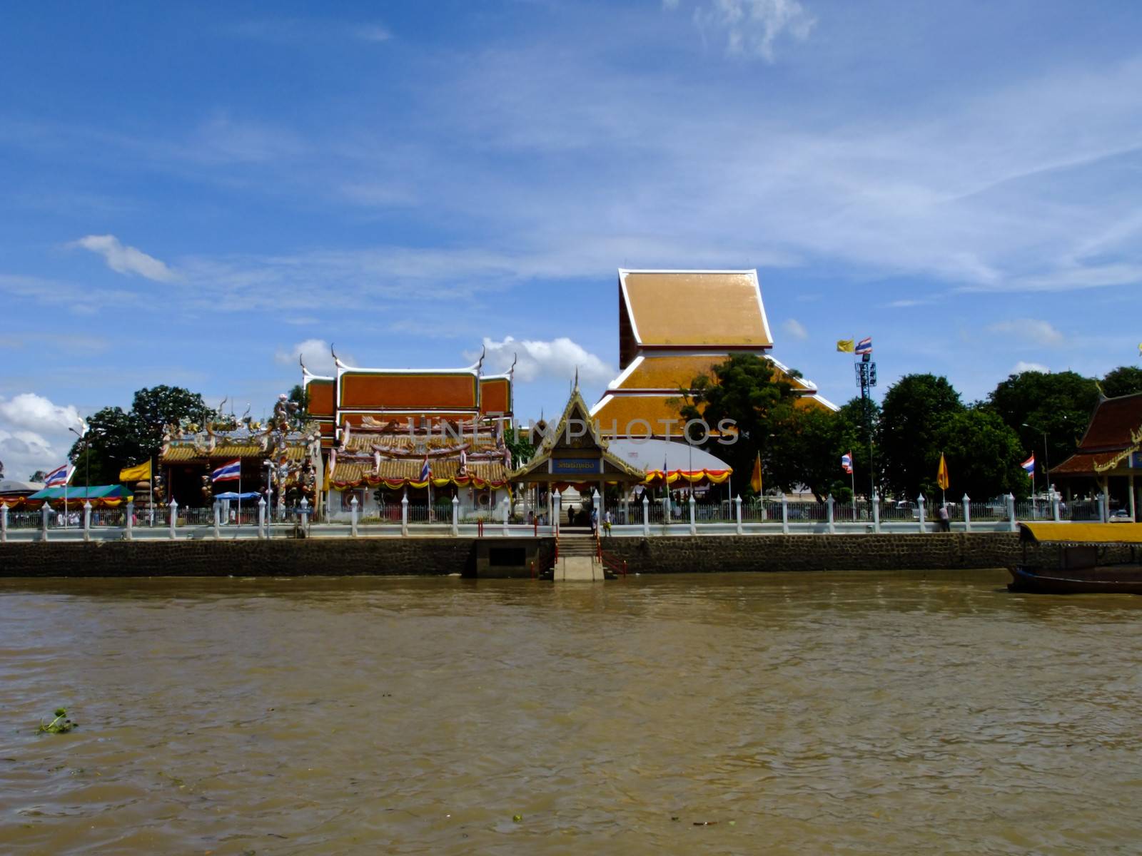 Phanan Choeng buddhist temple on the bank of Chao Praya river in by gururugu