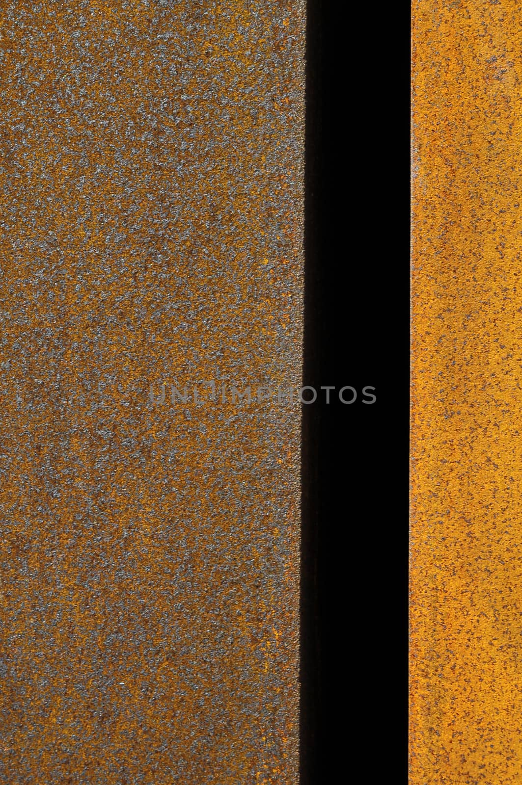 Orange Patterns on the Rusty Surface of Metal