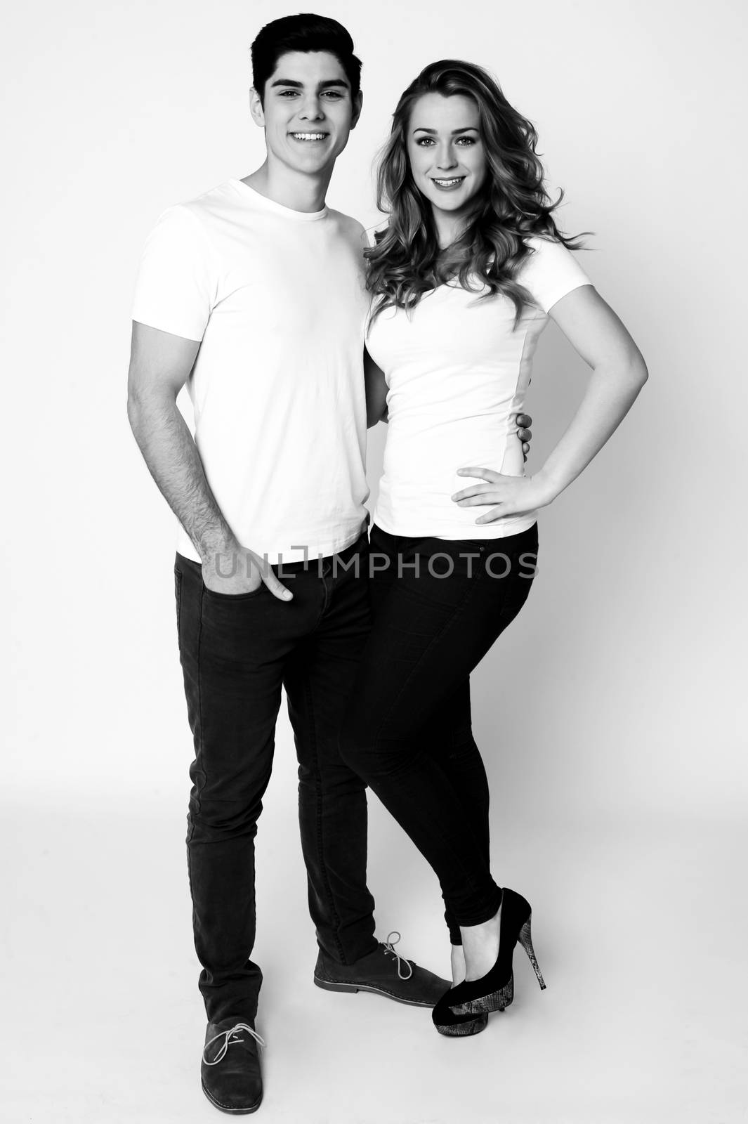 Full length portrait of an attractive couple by stockyimages
