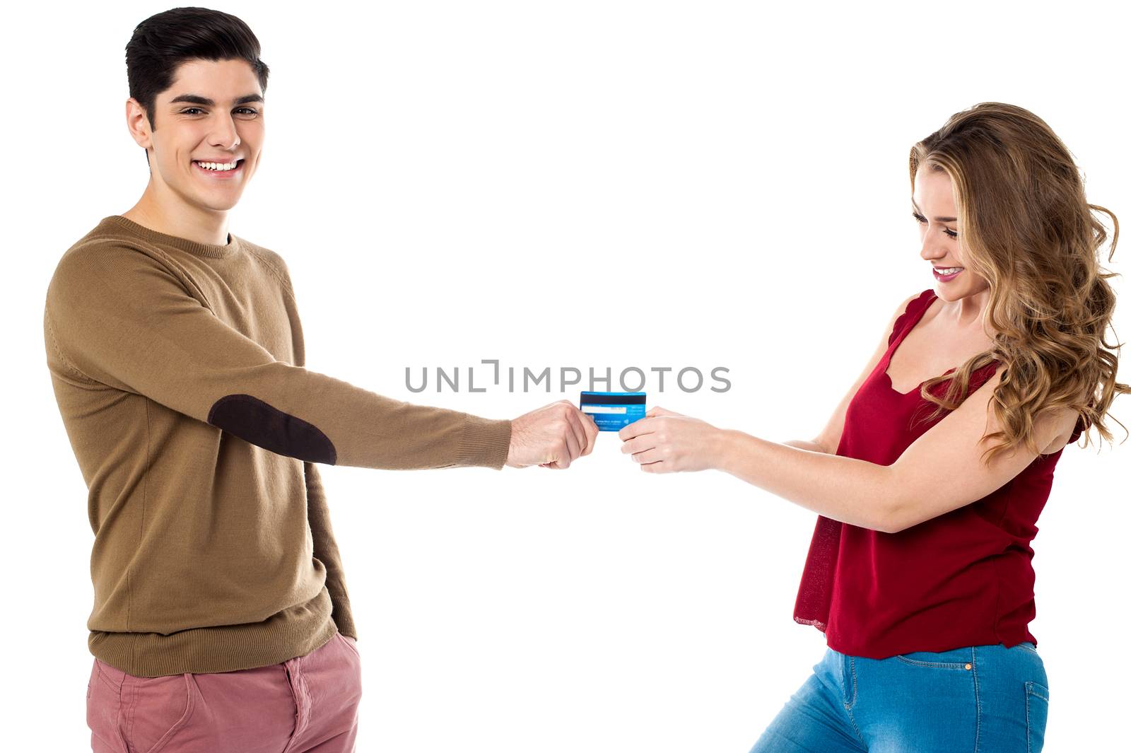 Girlfriend sweetly snatching debit card by stockyimages