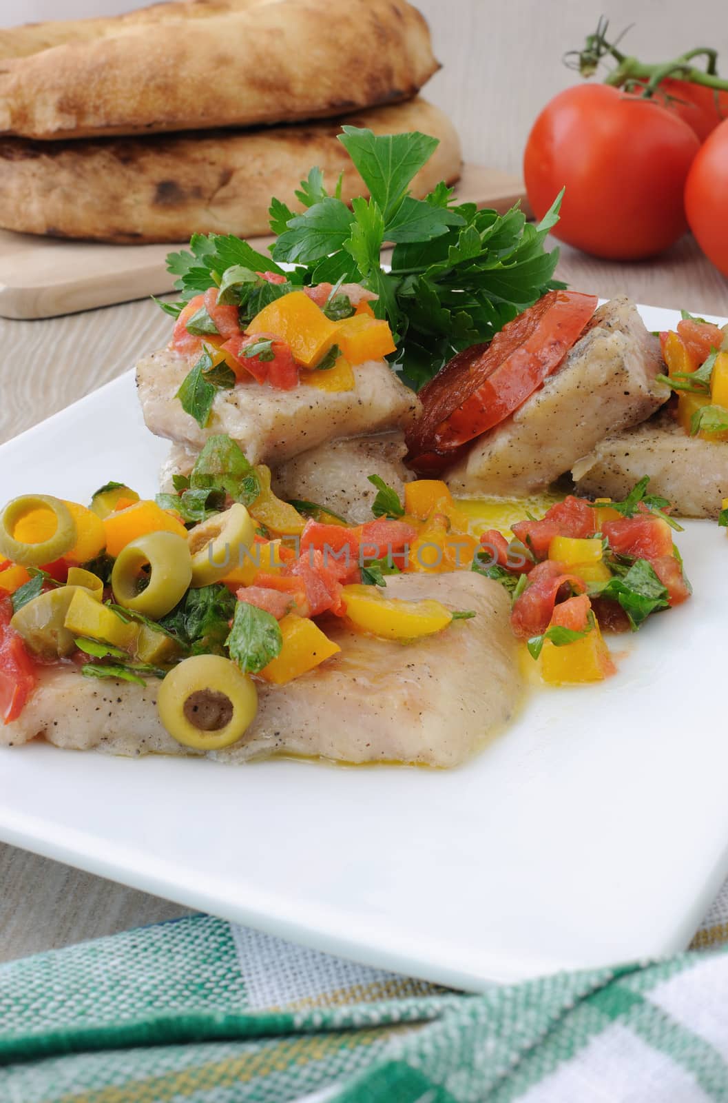 Fillet of fish under vegetables by Apolonia