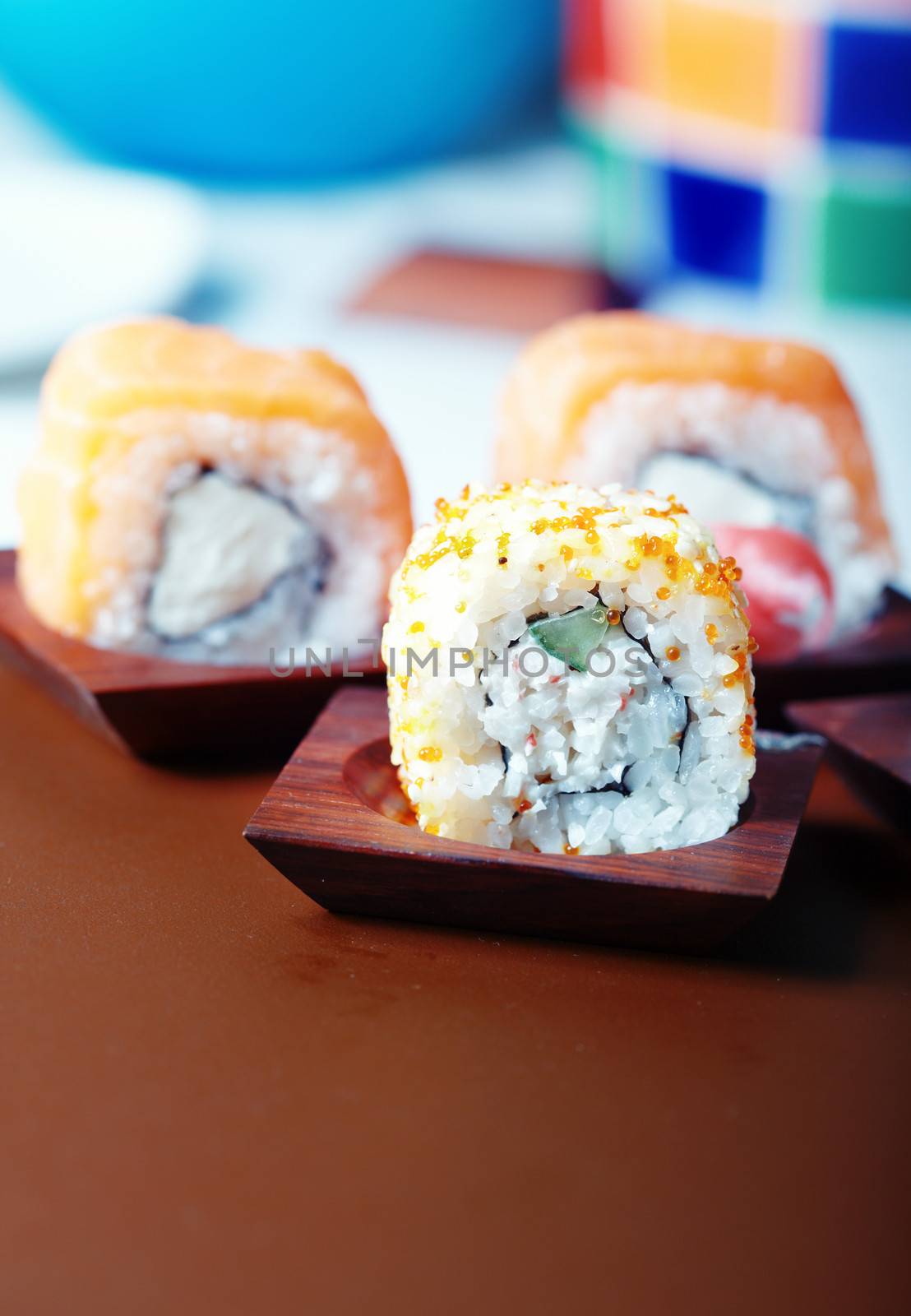 Sushi on the table. Vertical photo with natural colors. Shallow depth of field added for natural view