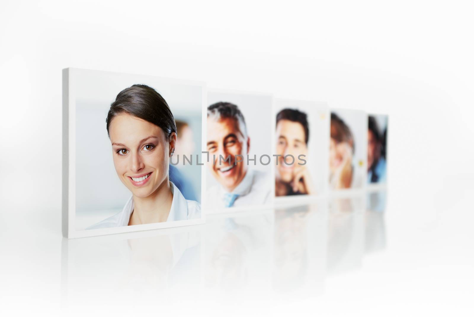 Portraits of a group of business people on white background