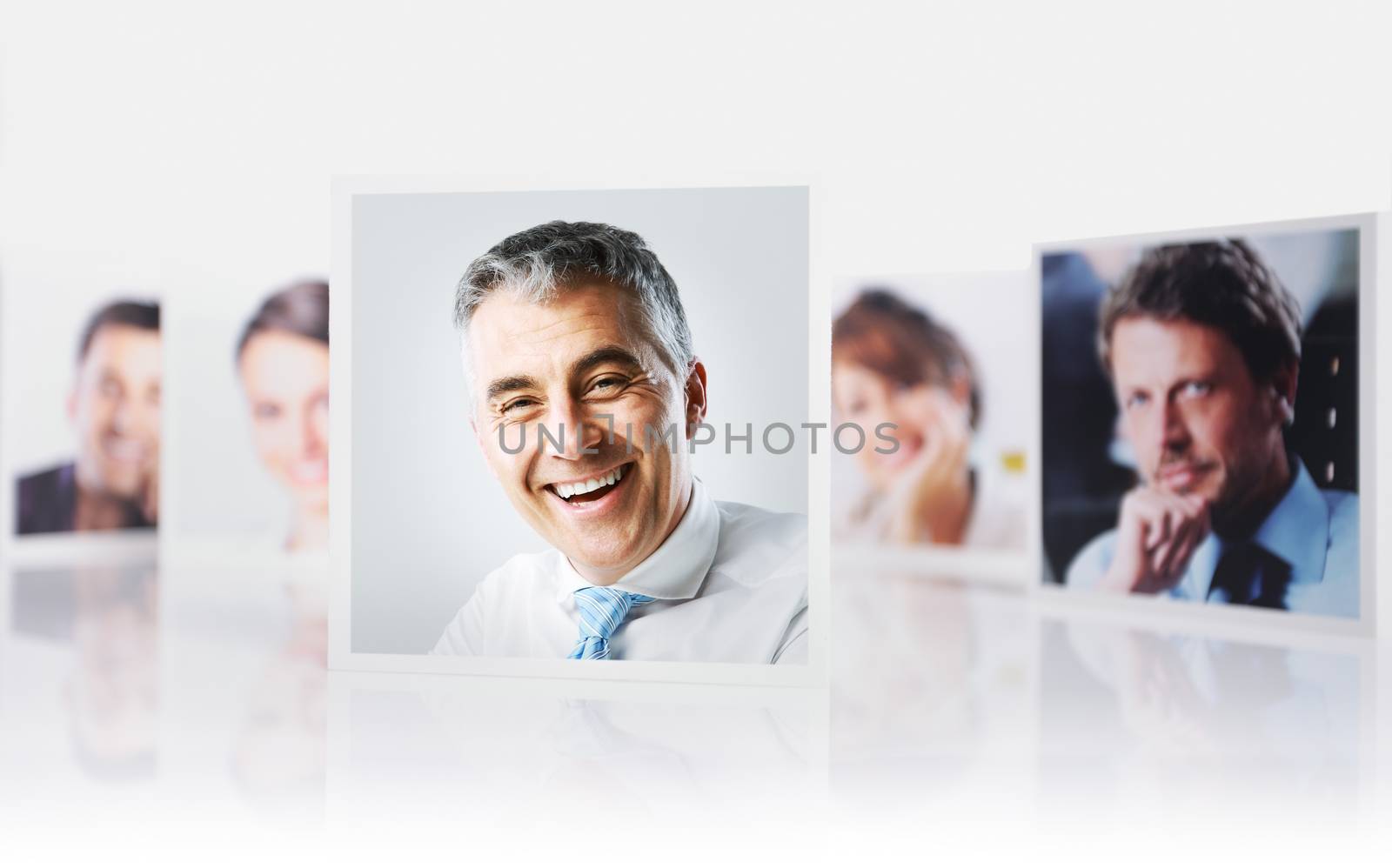 Portraits of a group of business people on white background