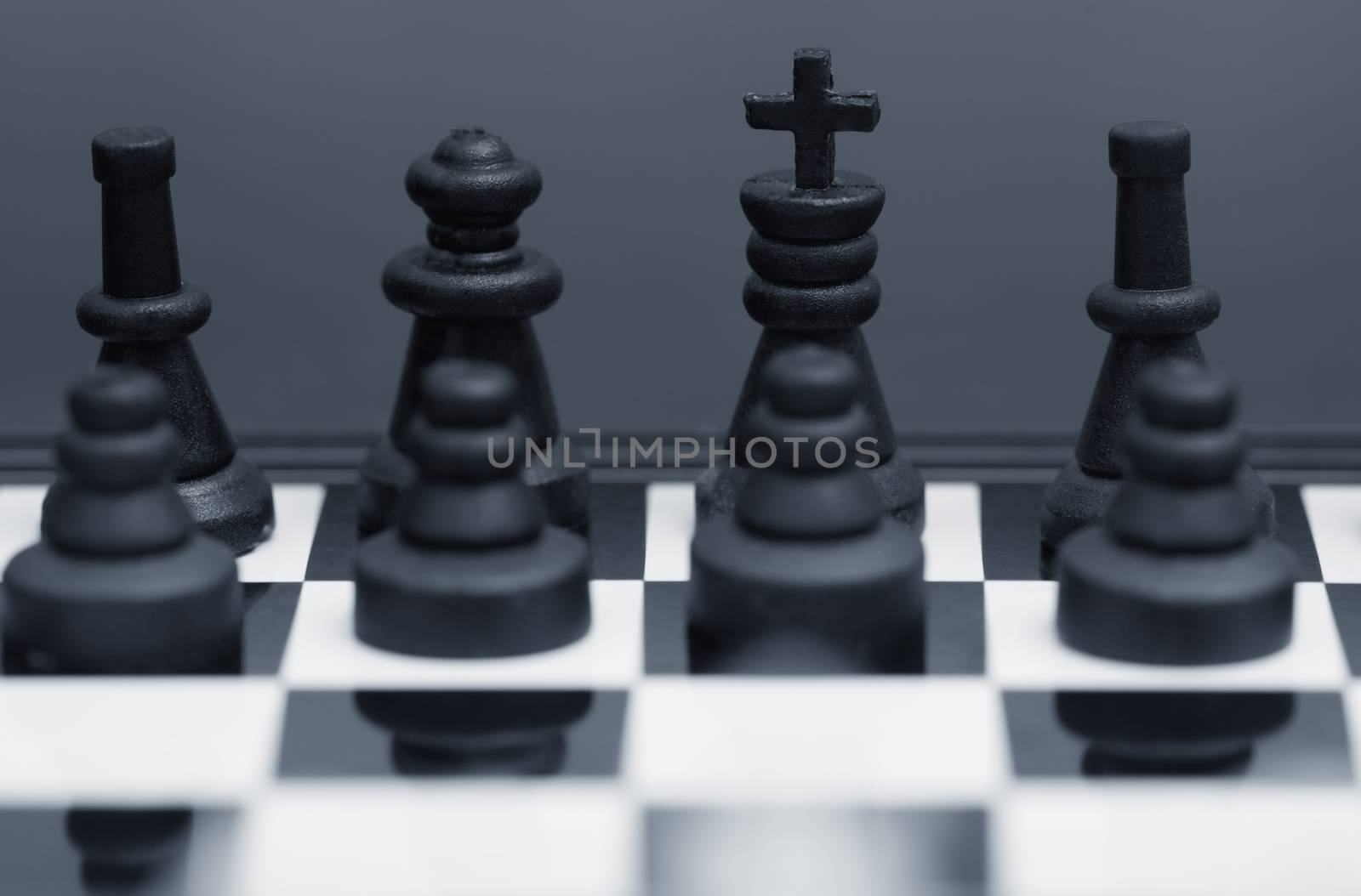 Close-up photo of the chessmen on a chessboard