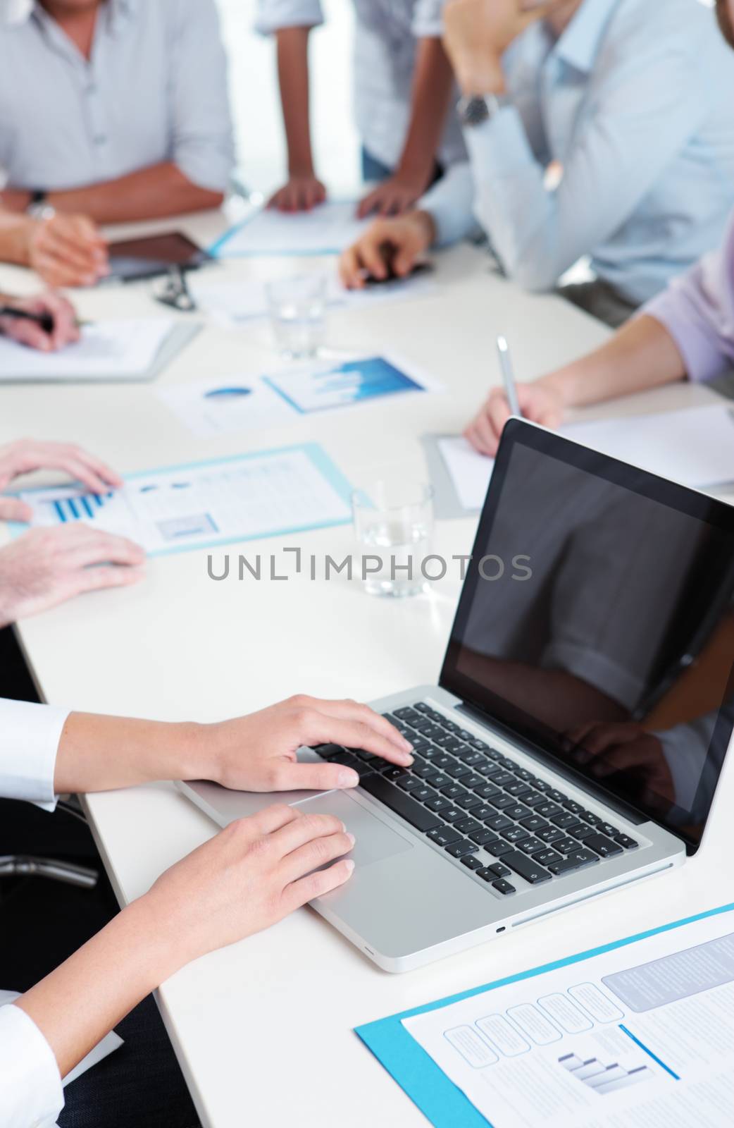Cropped image of a group of businesspeople working together as a team 